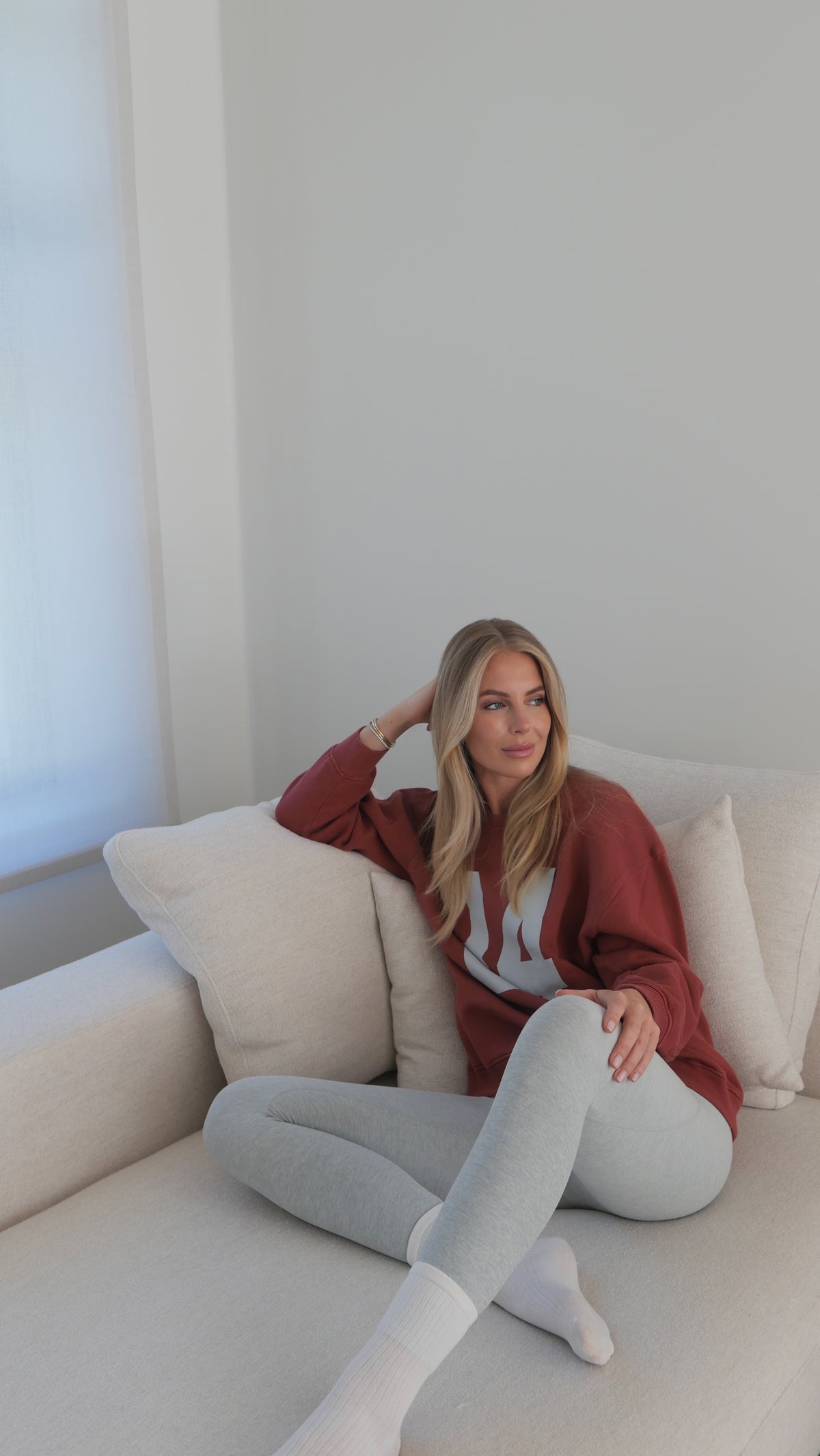 Long round sweater burnt orange